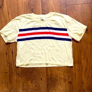 Yellow shirt with colored stripes